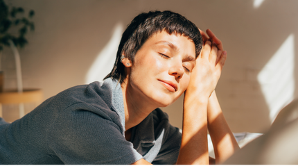 Young woman resting in sunlight