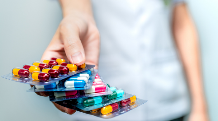 Packs of probiotic pills