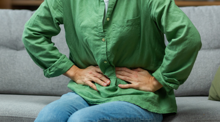 Woman holding her stomach