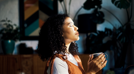 Young woman soaking up gentle sunlight