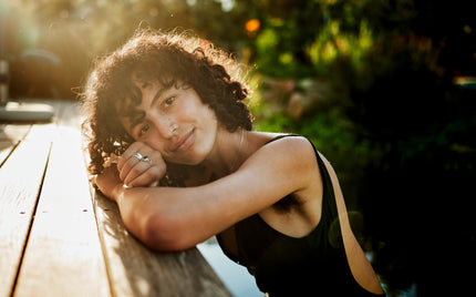 Relaxed young woman enjoying sunshine