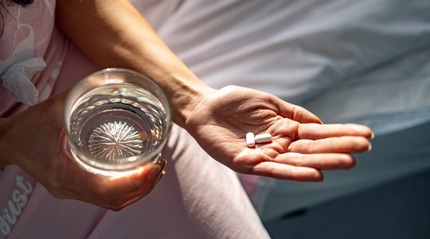 Hand holding supplements