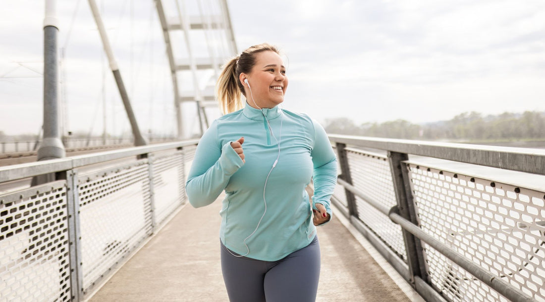 Woman is running across a bridge boardwalk