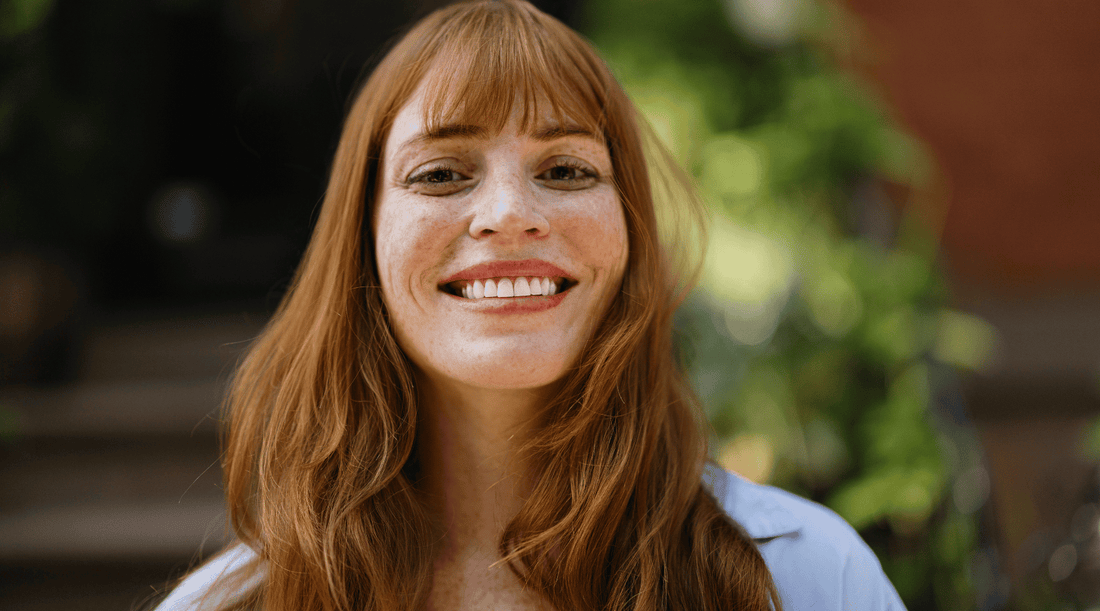 Smiling woman outdoors