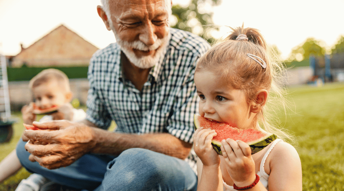 Grandfather and grand daughters spending time together