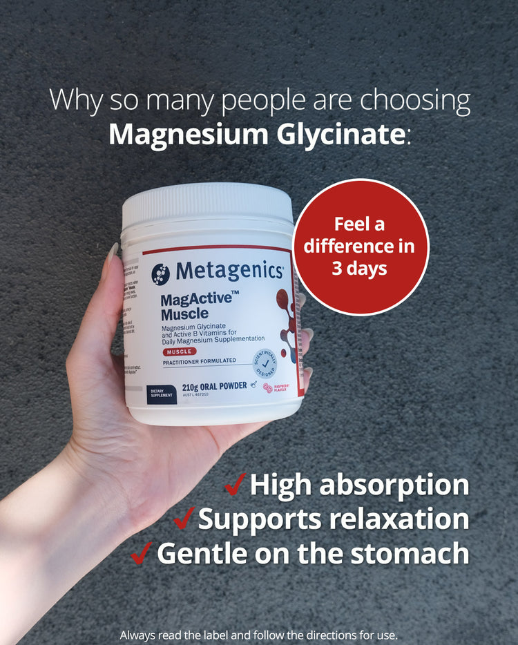 A hand holds a white container of Metagenics MagActive Muscle Magnesium Glycinate powder against a grey background. Text above reads: “Why so many people are choosing Magnesium Glycinate.” A red circle on the right says, “Feel a difference in 3 days.” Additional text lists benefits with red check marks: “High absorption,” “Supports relaxation,” and “Gentle on the stomach.” A disclaimer at the bottom says to always read the label and follow directions.