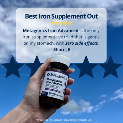 Hand holding a Metagenics Hemagenics Iron Advanced supplement bottle with a blue star background and review text.