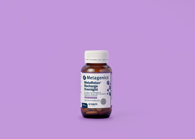 Metagenics MetaRelax Recharge Overnight supplement bottle on a purple background
